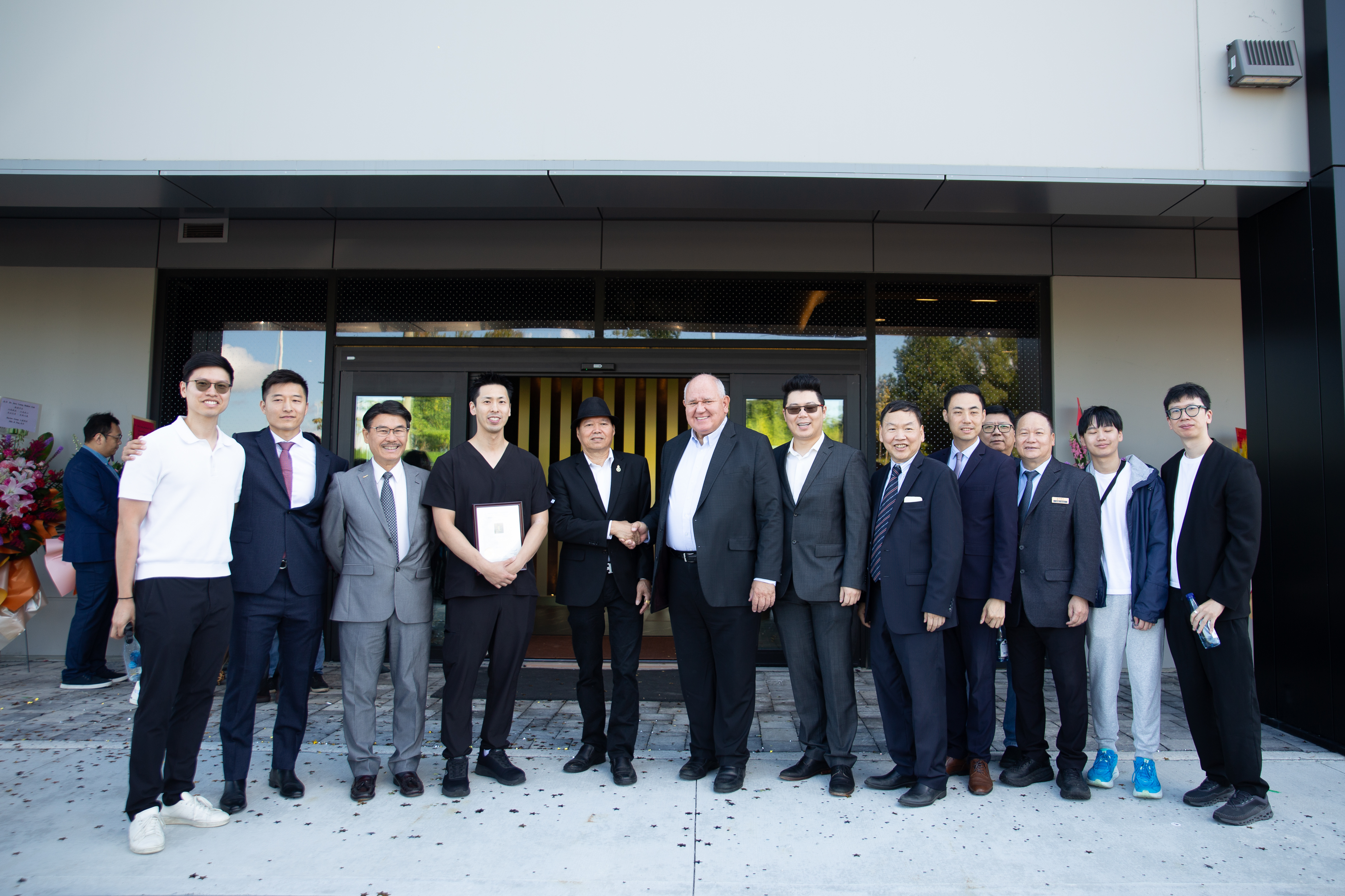Grand opening group photo with Mayor Frank Scarpitti and community leaders in Markham